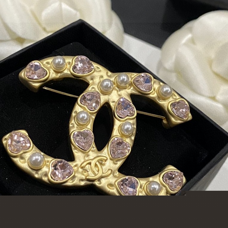 Ch*el brooches